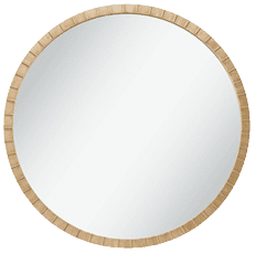a photo of a round brass mirror
